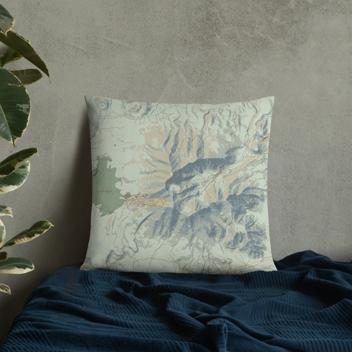 Custom Humphreys Peak Arizona Map Throw Pillow in Woodblock on Bedding Against Wall