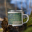Right View Custom Huntington Indiana Map Enamel Mug in Afternoon on Grass With Trees in Background