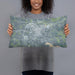 Person holding 20x12 Custom Huntington Indiana Map Throw Pillow in Afternoon