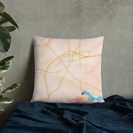 Custom Huntington Indiana Map Throw Pillow in Watercolor on Bedding Against Wall