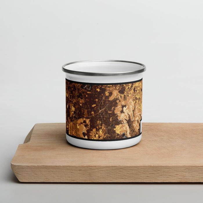 Front View Custom Huntsville Alabama Map Enamel Mug in Ember on Cutting Board
