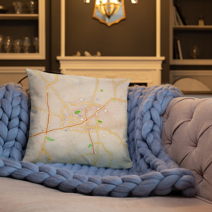 Custom Huntsville Alabama Map Throw Pillow in Watercolor on Cream Colored Couch