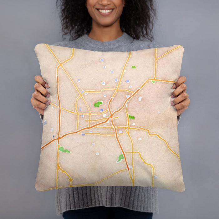Person holding 18x18 Custom Huntsville Alabama Map Throw Pillow in Watercolor