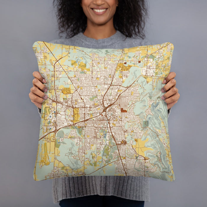 Person holding 18x18 Custom Huntsville Alabama Map Throw Pillow in Woodblock