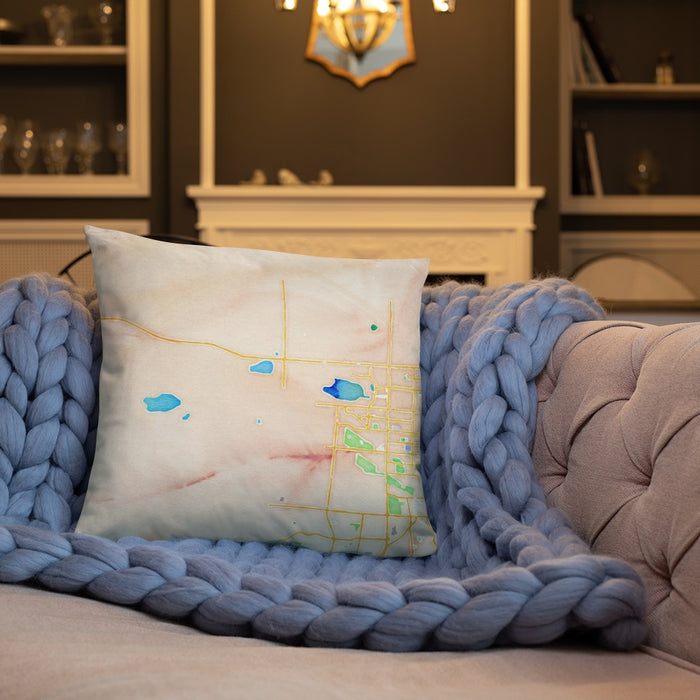Custom Hygiene Colorado Map Throw Pillow in Watercolor on Cream Colored Couch