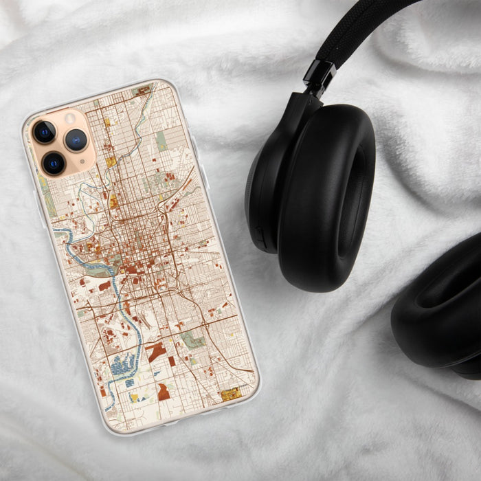 Custom Indianapolis Indiana Map Phone Case in Woodblock on Table with Black Headphones