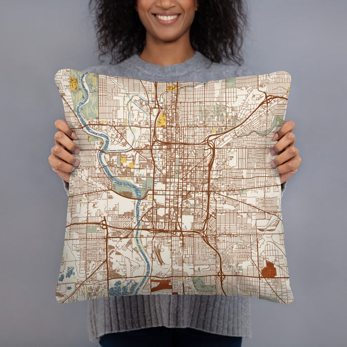 Person holding 18x18 Custom Indianapolis Indiana Map Throw Pillow in Woodblock