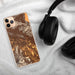 Custom Indio California Map Phone Case in Ember on Table with Black Headphones