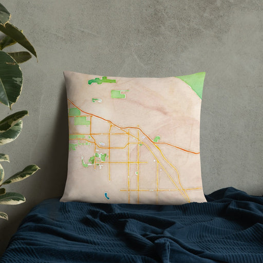 Custom Indio California Map Throw Pillow in Watercolor on Bedding Against Wall
