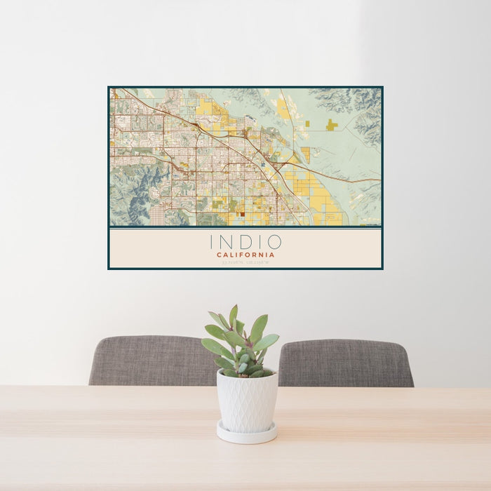 24x36 Indio California Map Print Landscape Orientation in Woodblock Style Behind 2 Chairs Table and Potted Plant