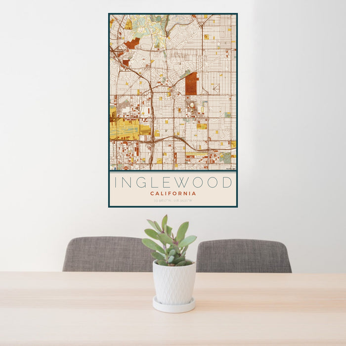 24x36 Inglewood California Map Print Portrait Orientation in Woodblock Style Behind 2 Chairs Table and Potted Plant