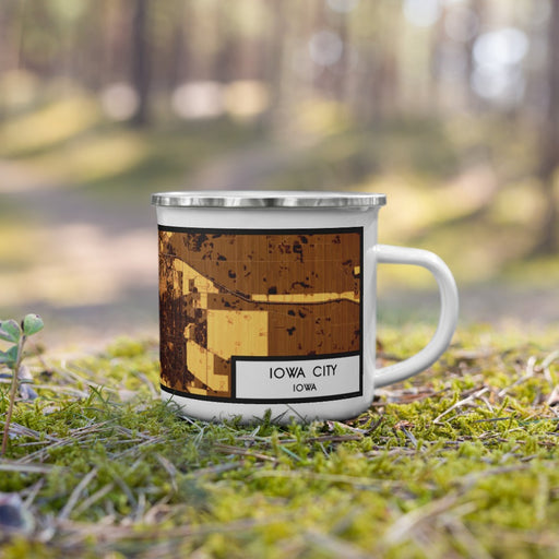 Right View Custom Iowa City Iowa Map Enamel Mug in Ember on Grass With Trees in Background