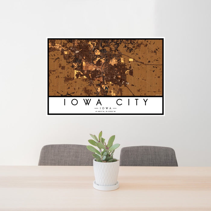 24x36 Iowa City Iowa Map Print Landscape Orientation in Ember Style Behind 2 Chairs Table and Potted Plant