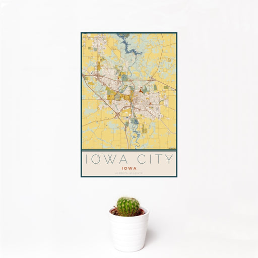 12x18 Iowa City Iowa Map Print Portrait Orientation in Woodblock Style With Small Cactus Plant in White Planter
