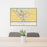 24x36 Iowa City Iowa Map Print Landscape Orientation in Woodblock Style Behind 2 Chairs Table and Potted Plant