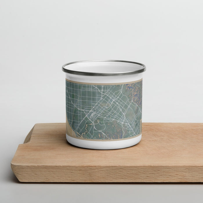 Front View Custom Irvine California Map Enamel Mug in Afternoon on Cutting Board