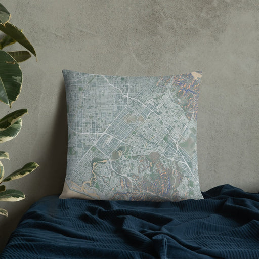 Custom Irvine California Map Throw Pillow in Afternoon on Bedding Against Wall