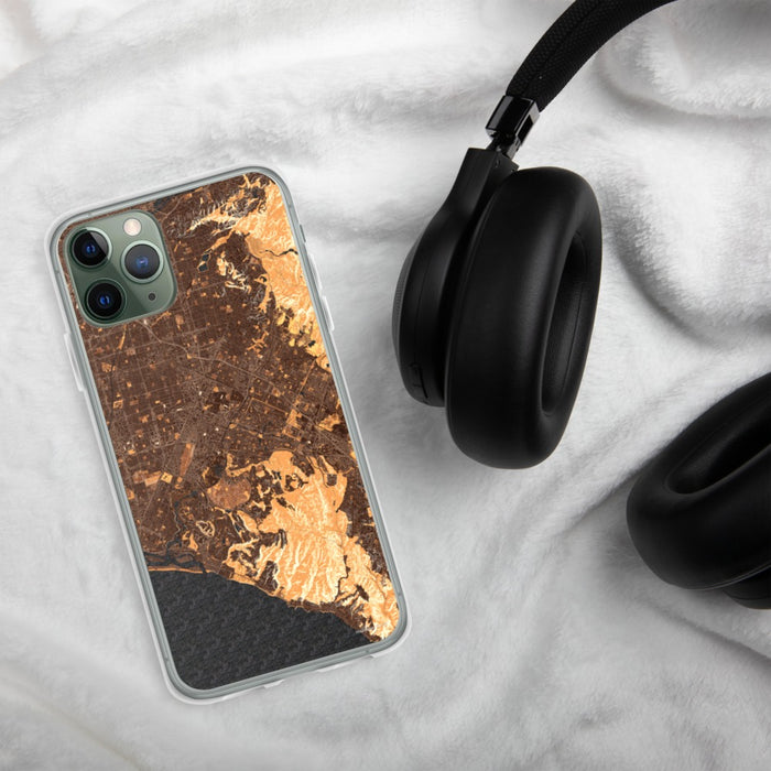 Custom Irvine California Map Phone Case in Ember on Table with Black Headphones