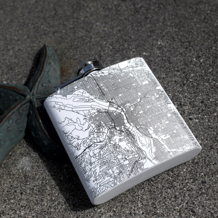 6oz Stainless Steel Flask in White with Custom Engraved Map on Concrete