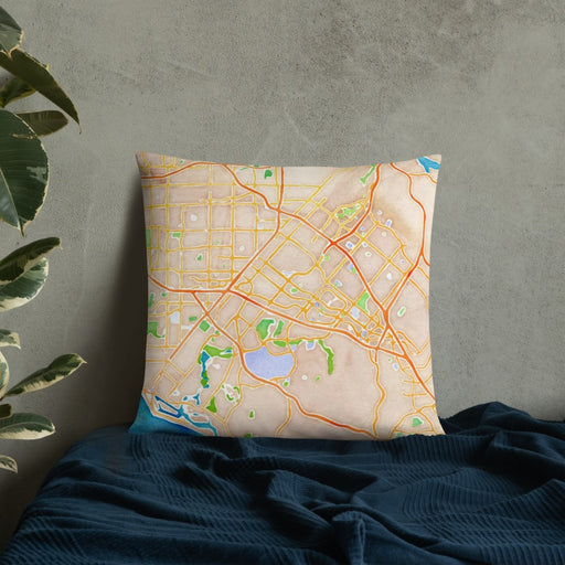 Custom Irvine California Map Throw Pillow in Watercolor on Bedding Against Wall