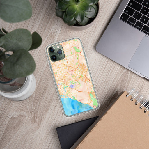 Custom Irvine California Map Phone Case in Watercolor on Table with Laptop and Plant