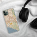 Custom Irvine California Map Phone Case in Woodblock on Table with Black Headphones