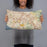Person holding 20x12 Custom Irvine California Map Throw Pillow in Woodblock