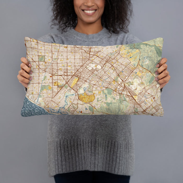 Person holding 20x12 Custom Irvine California Map Throw Pillow in Woodblock