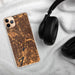 Custom Irving Texas Map Phone Case in Ember on Table with Black Headphones