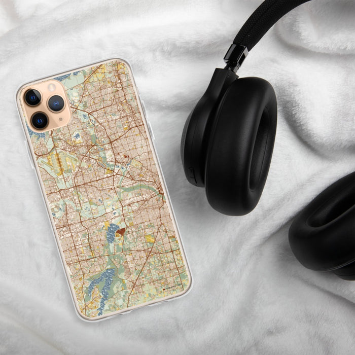 Custom Irving Texas Map Phone Case in Woodblock on Table with Black Headphones