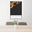 24x36 Isle Royale National Park Map Print Portrait Orientation in Ember Style Behind 2 Chairs Table and Potted Plant