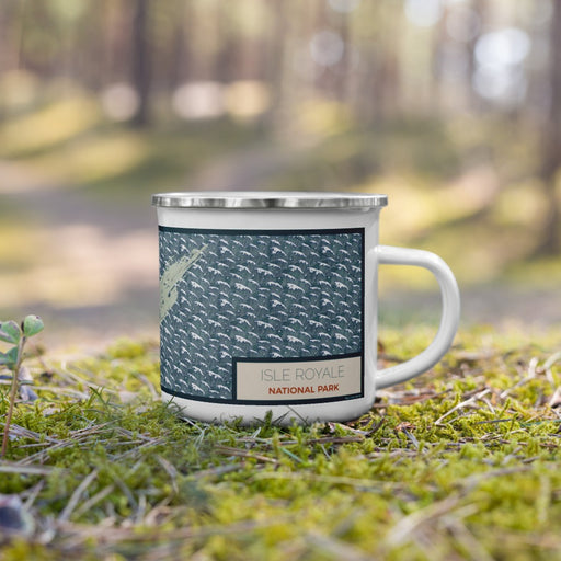 Right View Custom Isle Royale National Park Map Enamel Mug in Woodblock on Grass With Trees in Background