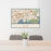 24x36 Islip New York Map Print Lanscape Orientation in Woodblock Style Behind 2 Chairs Table and Potted Plant