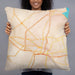 Person holding 22x22 Custom Jackson Mississippi Map Throw Pillow in Watercolor