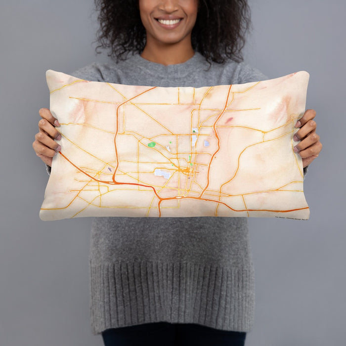 Person holding 20x12 Custom Jackson Mississippi Map Throw Pillow in Watercolor