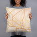 Person holding 18x18 Custom Jackson Mississippi Map Throw Pillow in Watercolor