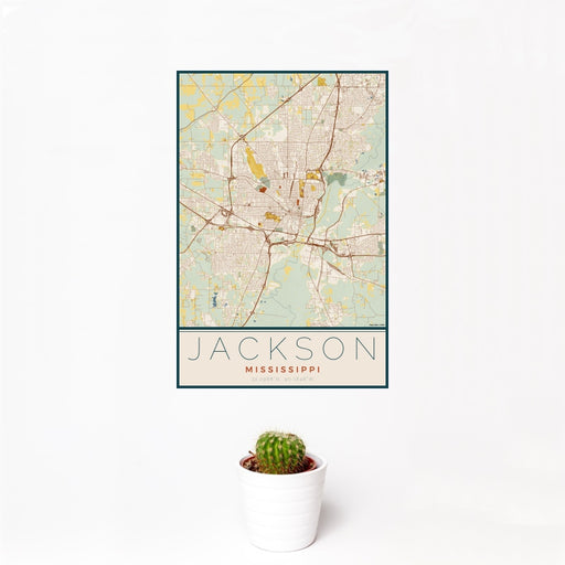 12x18 Jackson Mississippi Map Print Portrait Orientation in Woodblock Style With Small Cactus Plant in White Planter