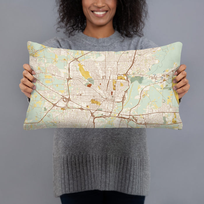 Person holding 20x12 Custom Jackson Mississippi Map Throw Pillow in Woodblock