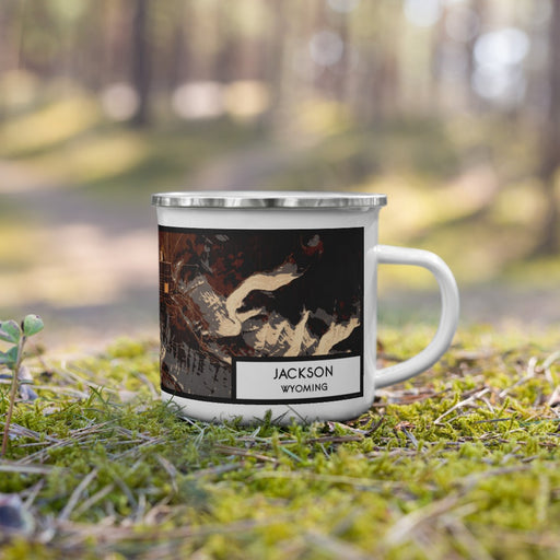 Right View Custom Jackson Wyoming Map Enamel Mug in Ember on Grass With Trees in Background