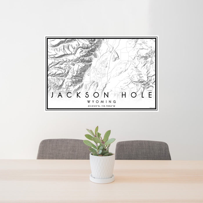 24x36 Jackson Hole Wyoming Map Print Landscape Orientation in Classic Style Behind 2 Chairs Table and Potted Plant