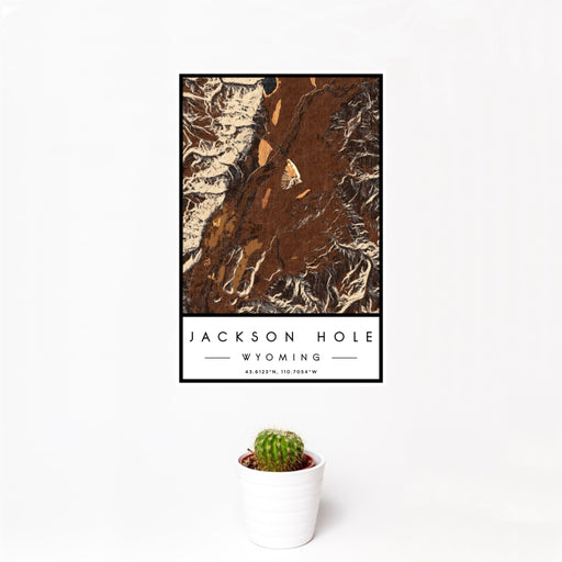 12x18 Jackson Hole Wyoming Map Print Portrait Orientation in Ember Style With Small Cactus Plant in White Planter