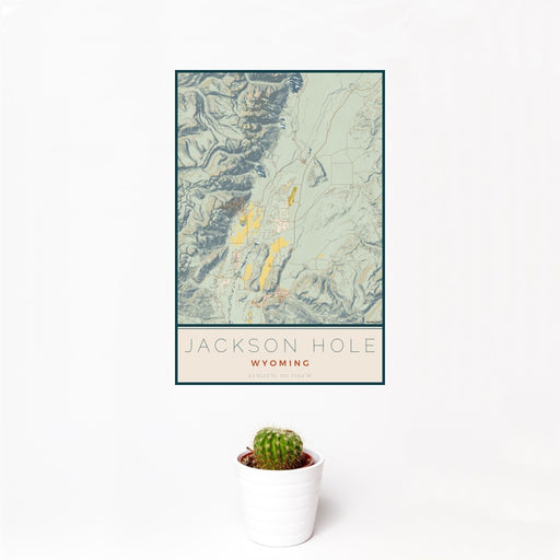 12x18 Jackson Hole Wyoming Map Print Portrait Orientation in Woodblock Style With Small Cactus Plant in White Planter