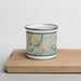 Front View Custom Jackson Hole Wyoming Map Enamel Mug in Woodblock on Cutting Board