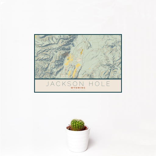 12x18 Jackson Hole Wyoming Map Print Landscape Orientation in Woodblock Style With Small Cactus Plant in White Planter