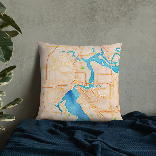 Custom Jacksonville Florida Map Throw Pillow in Watercolor on Bedding Against Wall