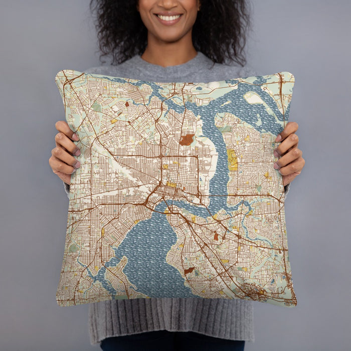 Person holding 18x18 Custom Jacksonville Florida Map Throw Pillow in Woodblock
