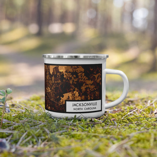 Right View Custom Jacksonville North Carolina Map Enamel Mug in Ember on Grass With Trees in Background
