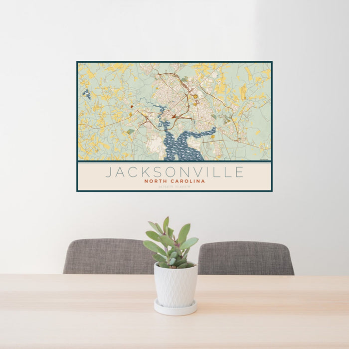 24x36 Jacksonville North Carolina Map Print Landscape Orientation in Woodblock Style Behind 2 Chairs Table and Potted Plant