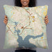 Person holding 22x22 Custom Jacksonville North Carolina Map Throw Pillow in Woodblock