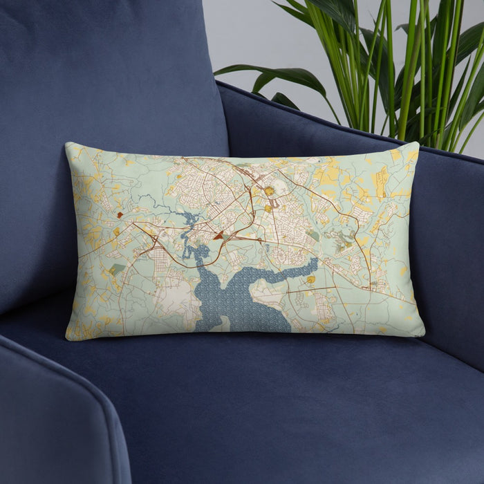 Custom Jacksonville North Carolina Map Throw Pillow in Woodblock on Blue Colored Chair